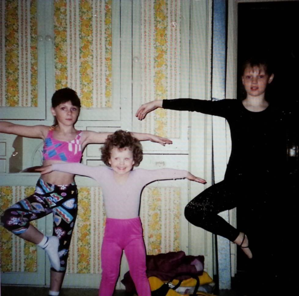 image of girls posing in dancewear on in kitchen