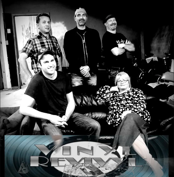 Vinyl Revivyl members on couch with logo