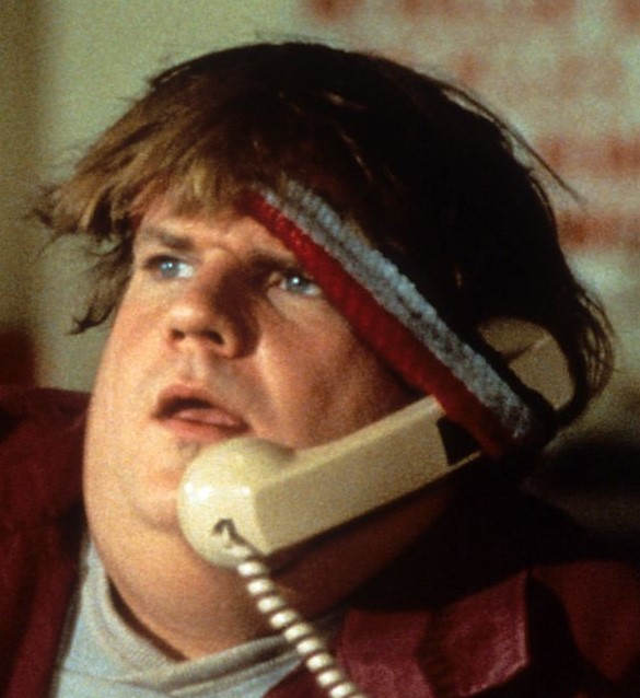 image of comedian Chris Farley with old style telephone duct taped around his head