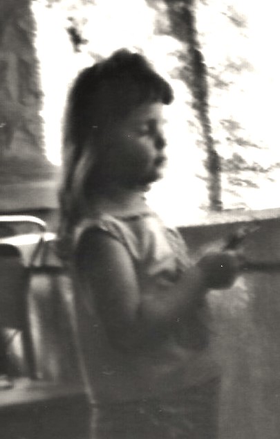 girl standing with her eyes closed circa 1967