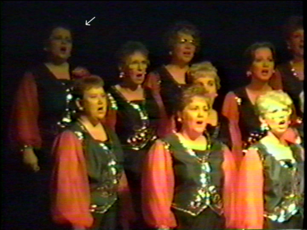 Lori  with other singers on stage